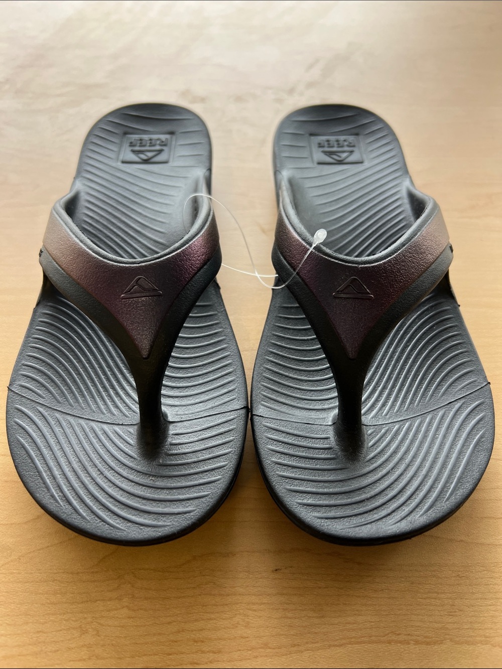Reef Women's Black Flip Sandals with Iridescent Strap